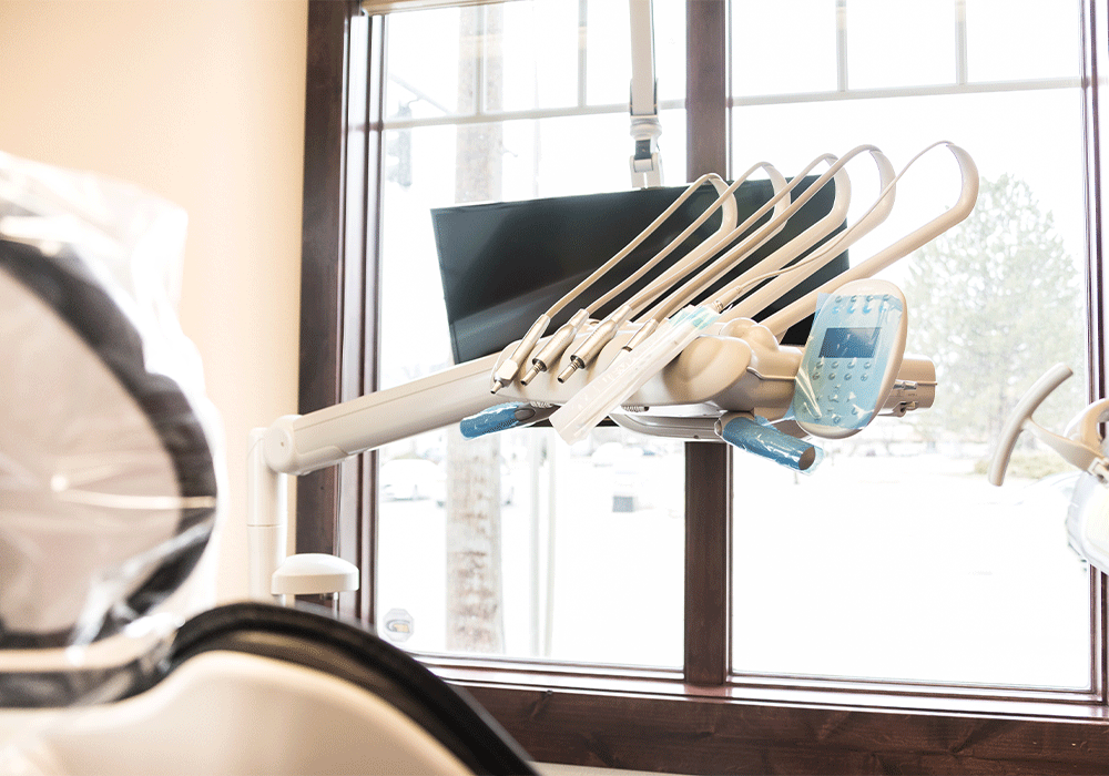 Dental exam tools next to a patient chair at Montana Dental Arts in Missoula, Montana.